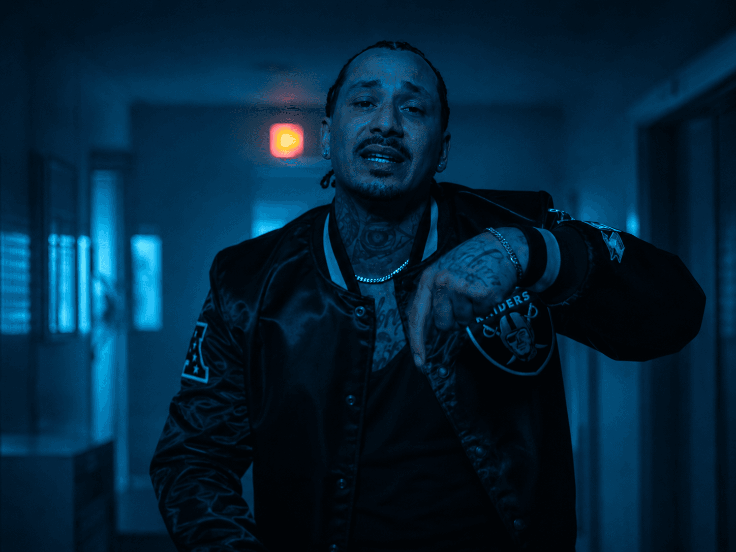 BR33Z in a blue-lit corridor